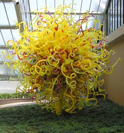 Glass sculpture by Dale Chihuly at an exhibition in Kew Gardens, London, England. The piece is 13 feet (4 metres) high